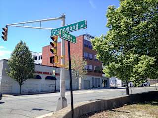Street corner with green traffic signs at 68 Beale Apartments, Quincy, MA 02169